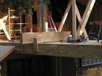 A rafter waits to be trimmed and lifted....