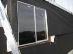 Leaky garage window gets de-installed -...