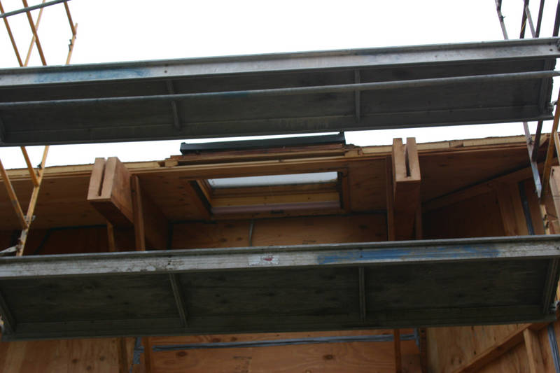 The existing rafters slotted for the...
