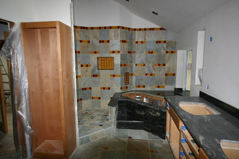 The bathroom tiling is just about done...