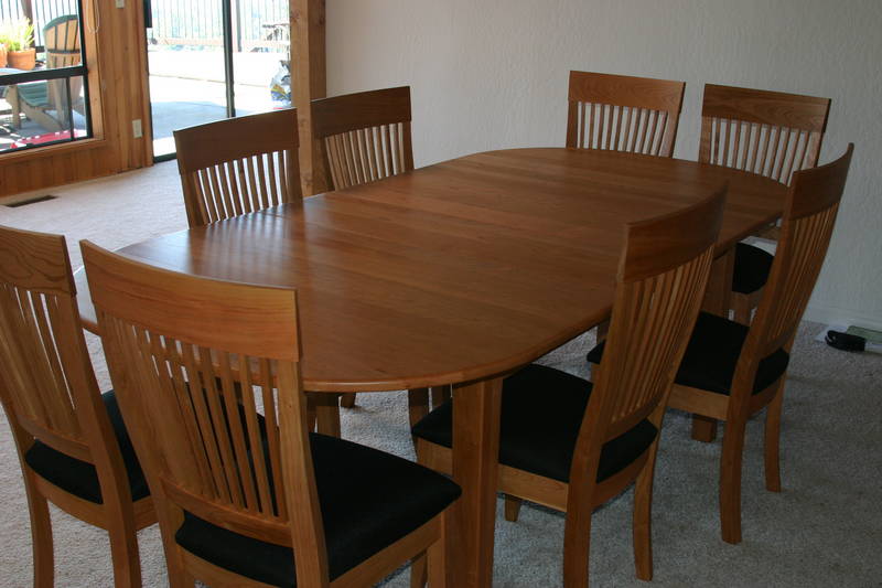 Dining table and chairs - The table opens to over 100 inches.